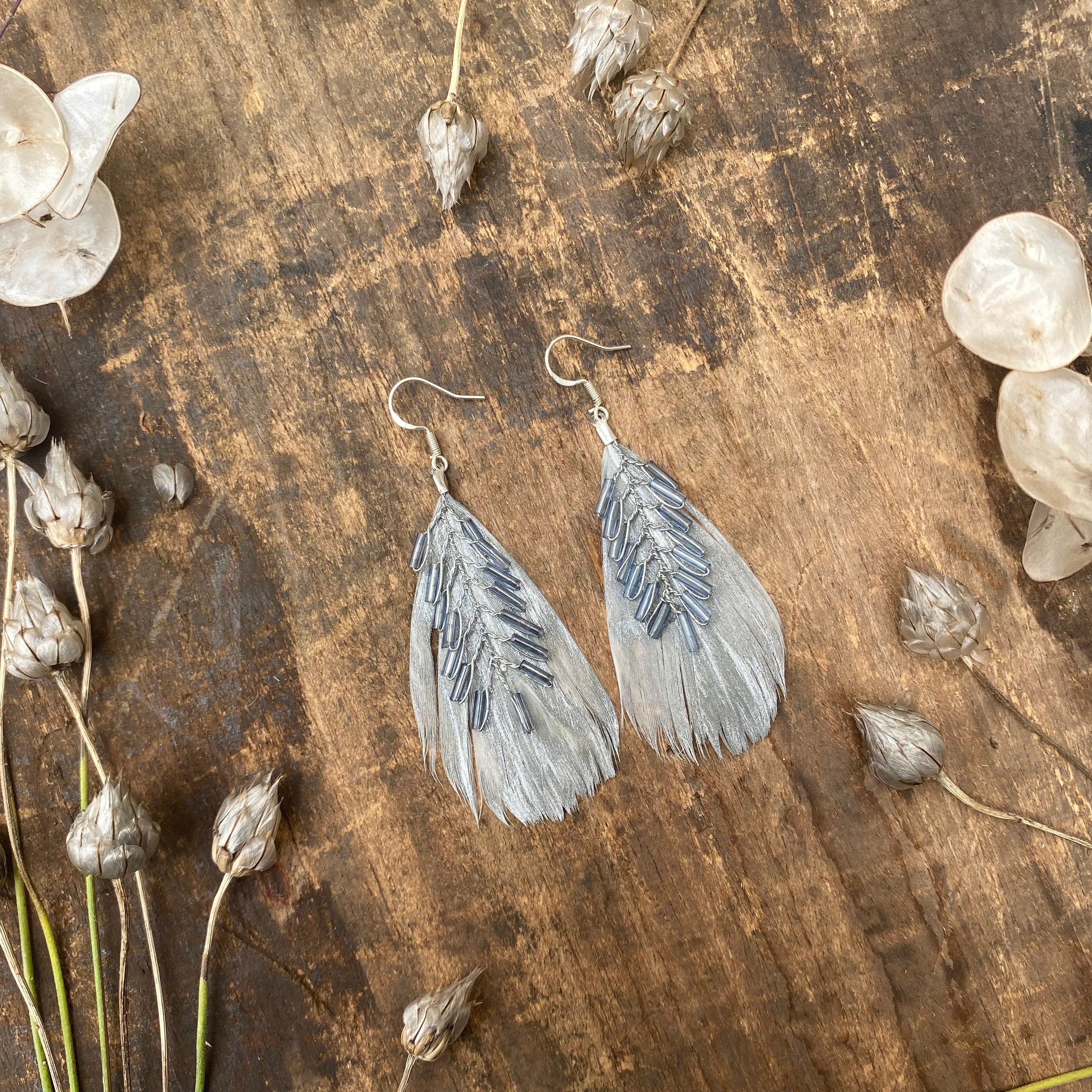 Natural Pheasant feather earrings with buckskin leather – Wildwood Damsel